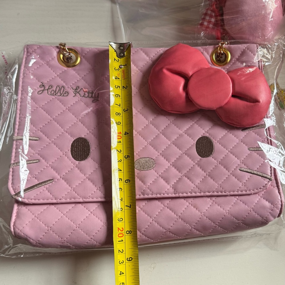 Signature Hello Kitty Pink Quilted Bag with Salmon Pink Bow and Shoulder Strap - Picture 9 of 10